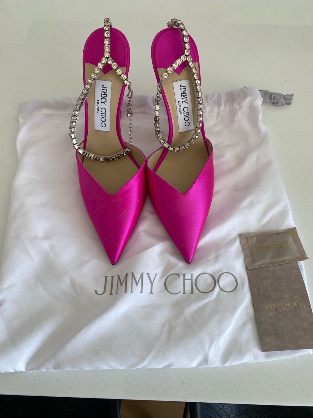New/never worn: Jimmy Choo Saeda Fuschia Heels.